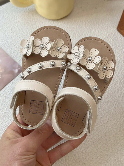 2026 New Girls' Sandals, 3D Flower + Rivet Decor Soft Material, Open Toe Lace-Up Flat Sweet Floral Style, Suitable For Daily Outings, Play, Birthday Parties And Holiday Celebrations. Size Runs Small