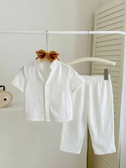 2pcs Baby Unisex White Summer Casual Vacation Loose Stand Collar Woven Solid Color Short Sleeve Shirt And Pants Set,Suitable For Outings,Daily Wear