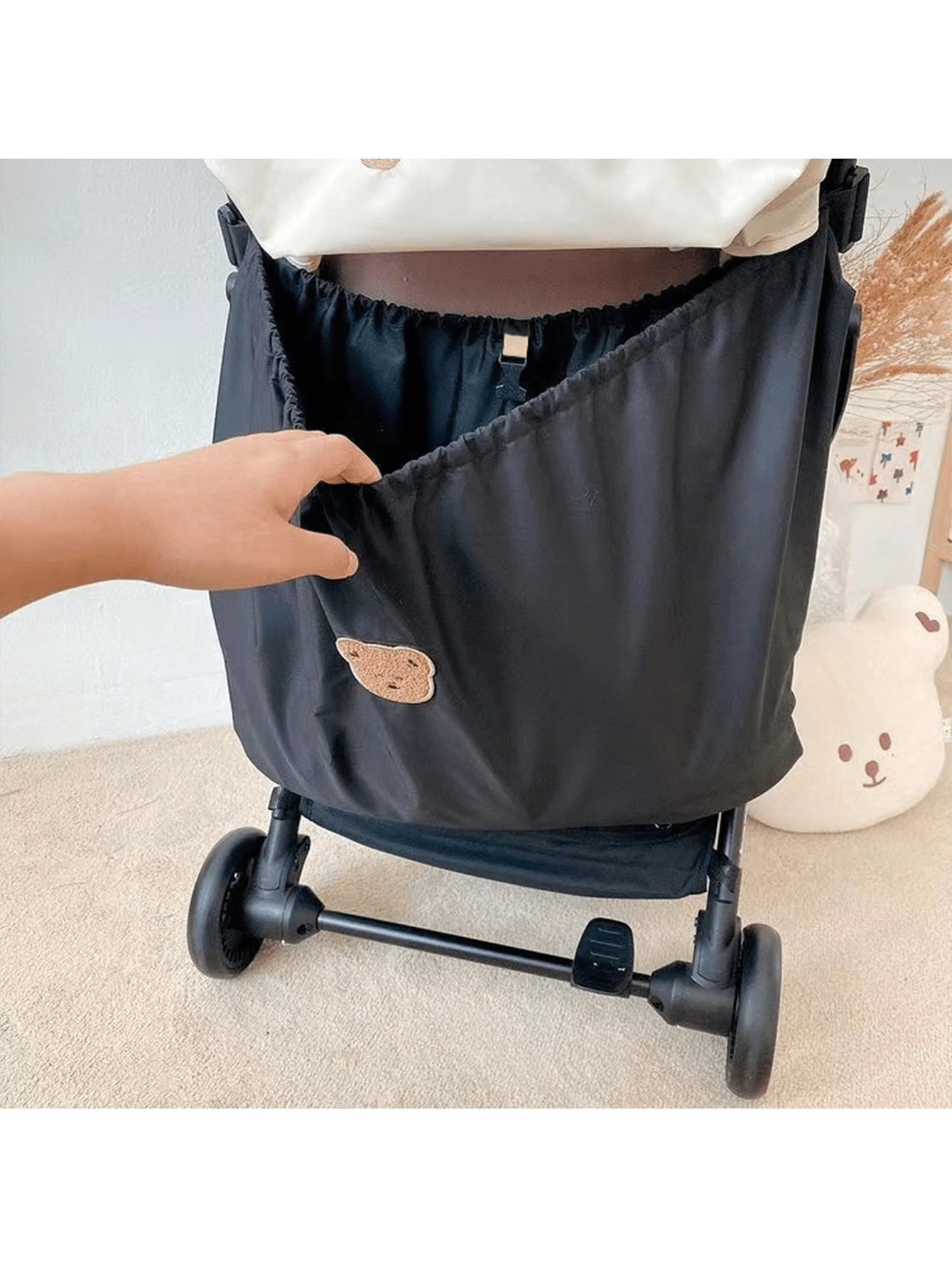 A Waterproof Bear-Themed Stroller Storage Bag For Convenient Outings