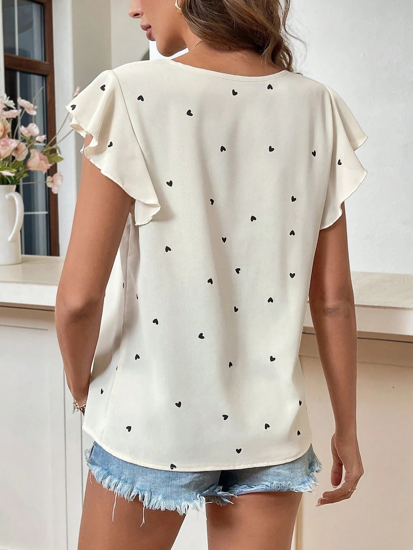 Easowa Spring Silhouette Flower Print Ruffle Hem Round Neck Women Blouse Cap Sleeve Tops For Summer Casual Top Floral