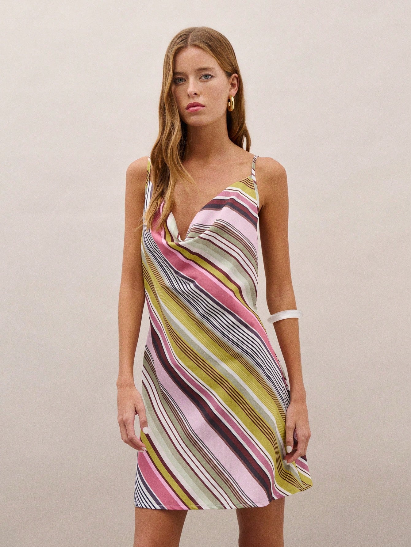 Nöista Striped Mini Dress With A Draped Cowl Neckline And Adjustable Straps On Back. Perfect For Summer