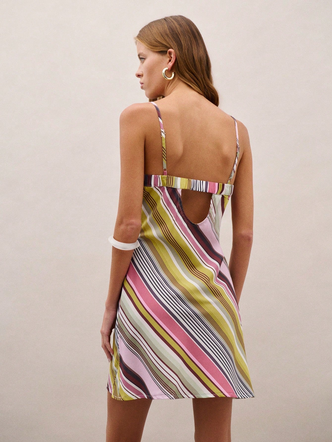 Nöista Striped Mini Dress With A Draped Cowl Neckline And Adjustable Straps On Back. Perfect For Summer
