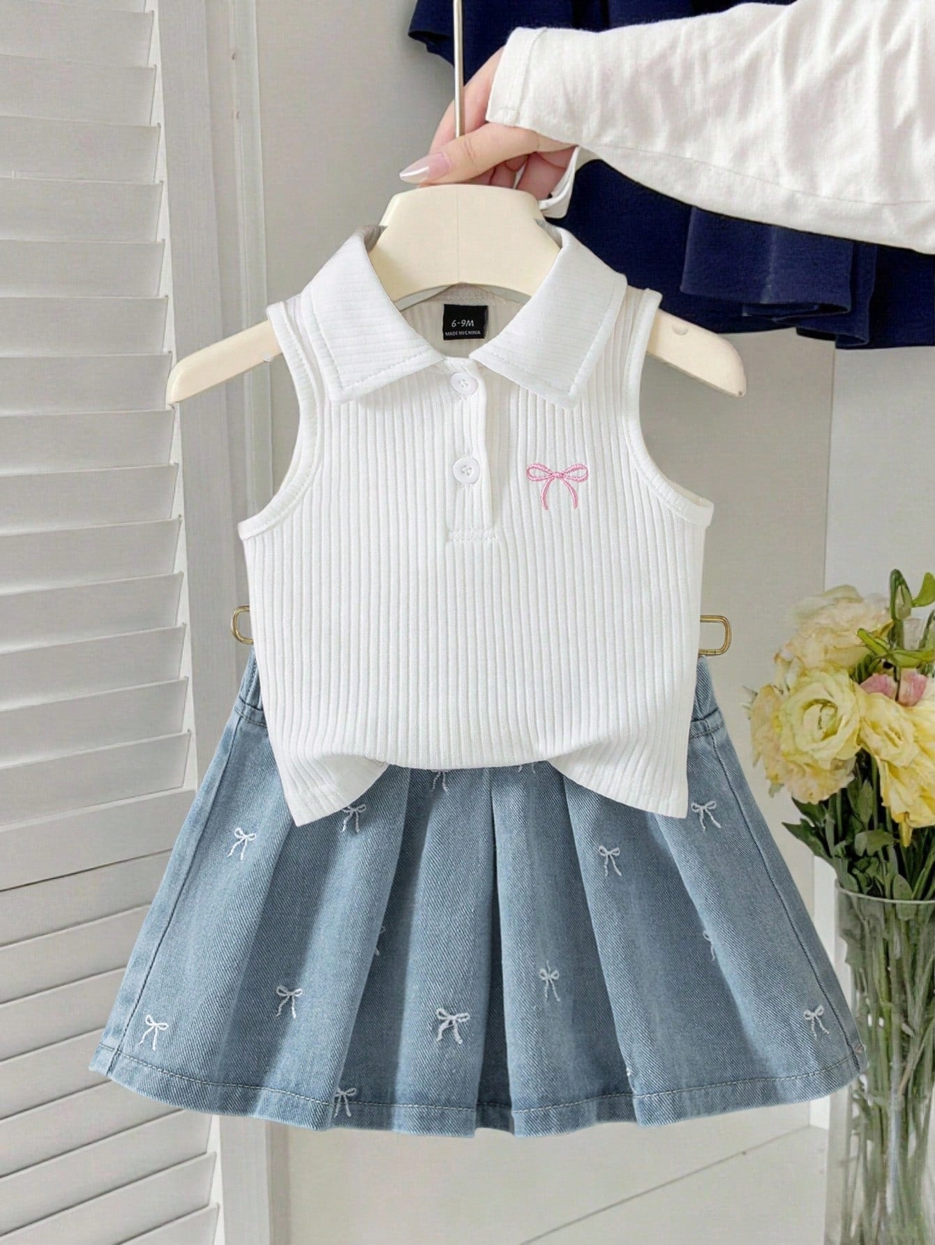 Vintaside Kids Infant Girl Short Sleeve Sleeveless Outfit Set, Top + Skirt, Top In Cream White/Skirt In Light Blue Denim, Top Features Sleeveless Medium Stretch Polo Collar Ribbed Knit Design With Pin